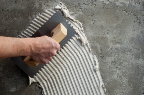 construction notched trowel with white cement