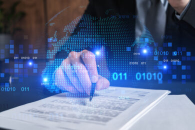 Businessman in suit signs contract. Double exposure with world map hologram. Man signing agreement international business concept.