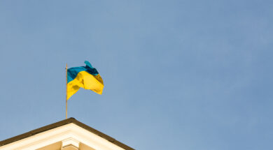 Ukrainian flag on top of a government building