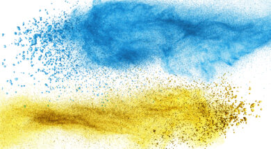 Blue and yellow powder explosion isolated