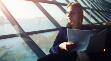 Portrait,Of,Young,Elegant,Woman,Sitting,In,Modern,Office,Interior