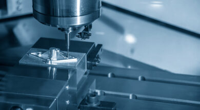 The CNC milling machine hi-precision cutting the aluminium parts