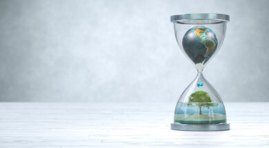 Earth planet in hourglass, Global warming concept.