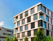 View of modern block of flats with blue sky