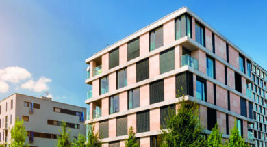 View of modern block of flats with blue sky