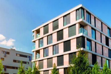View of modern block of flats with blue sky