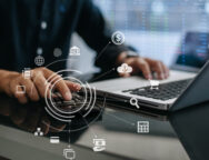 Businessman calculating online stock trading Stock brokers looking at graphs, indices and numbers on tablets and laptops. business success concept.