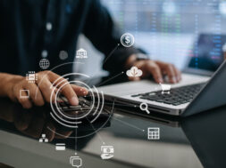 Businessman calculating online stock trading Stock brokers looking at graphs, indices and numbers on tablets and laptops. business success concept.